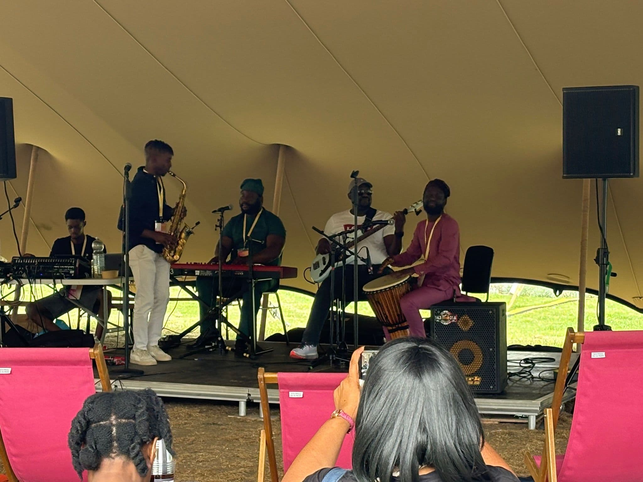 AfroSync live at a festival marquee
